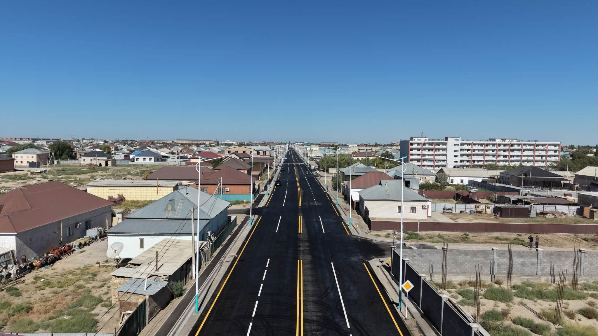 A widened street and a new bridge were built for the convenience of city residents