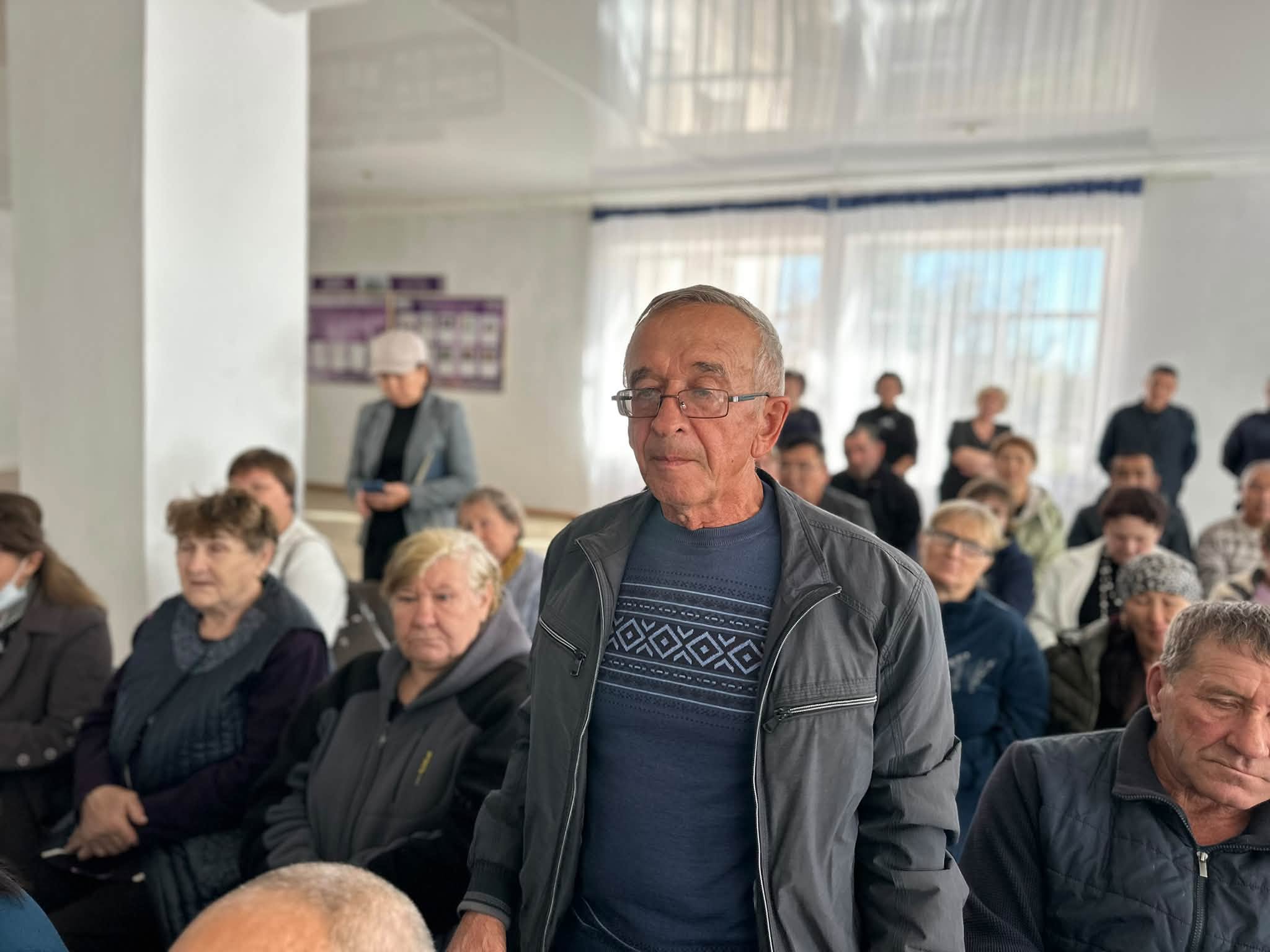 Участник встречи акима с населением